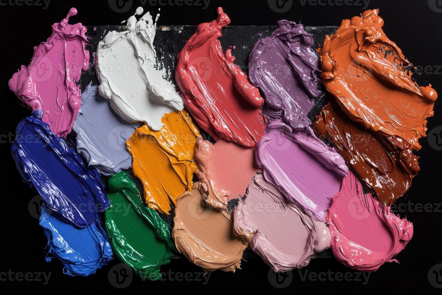 Vibrant oil paint palette with thick brushstrokes on a dark background photo