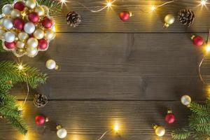 Christmas decor framing a wooden table photo