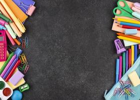 Back to school background with school supplies background photo