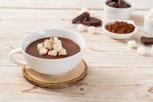 Hot chocolate with marshmallows in cup photo