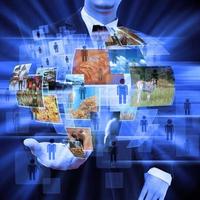 businessman holding social network photo