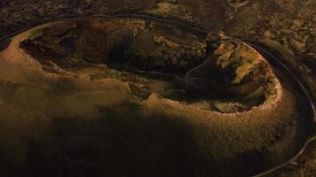 Close drone shot at the crater of scary volcano in Canarias. video