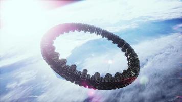 Unidentified alien spaceship flying near Earth elements furnished by NASA video