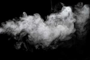polvo abstracto o humo aislado sobre fondo negro foto