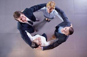 business people group joining hands photo