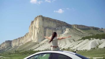 Happy woman on summer car vacation video