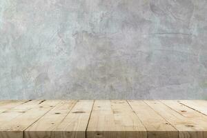 Empty wooden table and  concrete  wall texture and background with copy space, display montage for product. photo