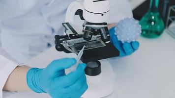 Medical Science LaboratoryPortrait of Beautiful Black Scientist Looking Under Microscope Does Analysis of Test Sample. Ambitious Young Biotechnology Specialist, working with Advanced Equipment video