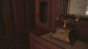 Historic antique wooden telephone. Old house decoration. video