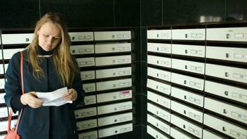Young woman being happy with received letter video