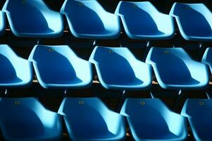 a row of blue chairs photo