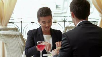 Having lunch with business partner video