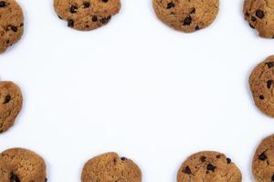 chocolate cookies frame on white background photo