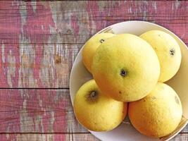 Oranges fruit on wooden background video
