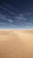 Desolate Desert Landscape Under Blue Sky and White Clouds video