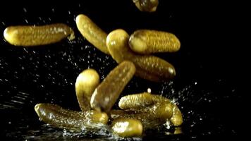 Super slow motion Pickled cucumbers. High quality FullHD footage video