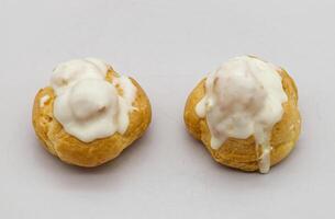 Cream bigne mignon, bigne alla crema. Traditional Italian pastry dessert photo