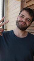 Young Boy Makes Victory Sign Smiling video