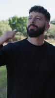 Young Man Dances Cheerfully In Countryside Nature video