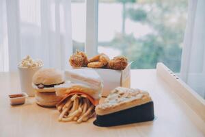 Closeup of home made burgers on wooden background photo