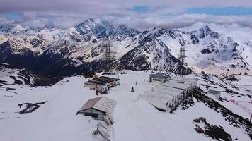 Aerial view of the mountain climber shelters on the slope of Mount Elbrus video
