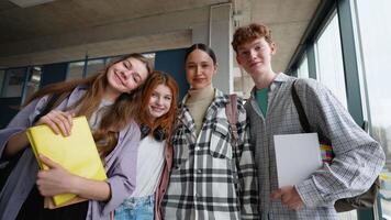 Happy group of students in college video