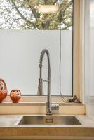 A window with a white curtain photo