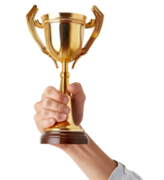 A hand holding a golden trophy. Represents success and victory. png