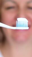 adult woman brushing her teeth Brushing Teeth with a Paste and Tooth Brush a Close up Shot of Woman Lips video