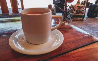 Cup of americano black coffee in restaurant cafe in Mexico. photo