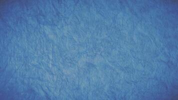 une bleu papier texture Contexte avec une peu petit froissé pièces video