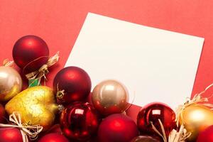 Greeting card mock up with christmas ornaments photo