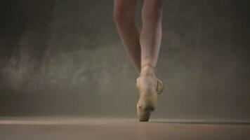 Girl Ballerina Posing In Studio. Young incredibly beautiful girl ballerina posing and dancing in a black studio video