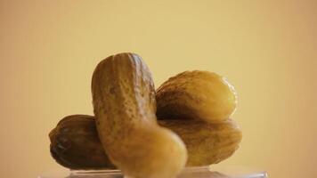 Pickled gherkins rotating. Loop. video