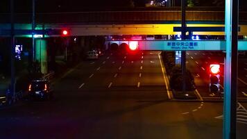 une nuit laps de temps de le Urbain ville rue dans Shinjuku longue coup Zoom video