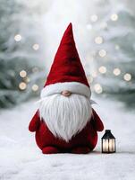 Festive christmas gnome with lantern in snowy scene photo