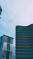 Two Tall Buildings Standing Side by Side video
