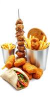 Delicious assortment of grilled meat, fried snacks, and fresh vegetables served in a vibrant presentation photo