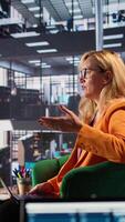 Vertical Diverse businesswomen in a strategic meeting discussing organizational growth and leadership goals. Powerful leaders in a professional office setting, driving ambitious partnership. Camera B. video