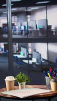 Vertical Modern luxurious conference room with a monitor showing data analytics, space used for business staff to discuss company ideas. Empty high end professional office enhances productivity. video