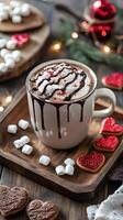 A cup of hot chocolate with marshmallows and hearts photo