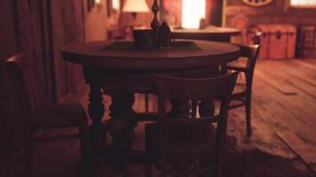 Rustic wooden saloon interior with tables and chairs in warm lighting video