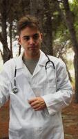 Sad Doctor Prepares for Bad News to Patient in Park Outside Hospital video
