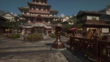 Traditional Japanese architecture in a serene courtyard surrounded by nature video