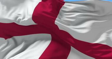 bandeira do Inglaterra acenando às vento dentro azul céu, ciclo video