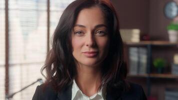 Serious Caucasian woman shake nod head positive agree approve female office boss girl businesswoman manager waving yes business positively answer looking at camera support indoors leader concentrated video