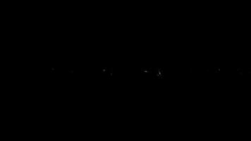 óptico bengalas partículas animación en negro resumen antecedentes video