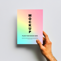 hand holding a colorful paper mockup psd