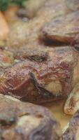 Grilled chicken preparation in a rustic kitchen setting video