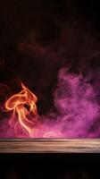 Wooden Surface with Orange Flames and Purple Smoke photo